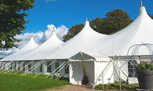 high-quality portable restrooms stationed at a wedding, meeting the needs of guests throughout the outdoor reception in Ashton